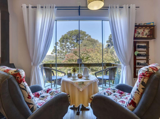 Suíte Magnólia - Vista para o jardim - Charme - Urubici | Serra Catarinense Vista para o jardim - Charme - Urubici | Serra Catarinense